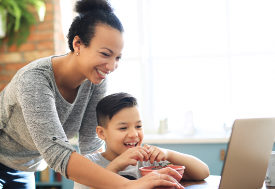 Mom and son on laptop